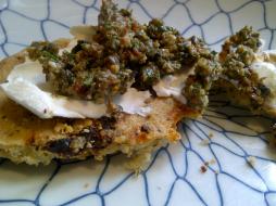 Tapenade with cream cheese on Rosemary Focaccia bread.